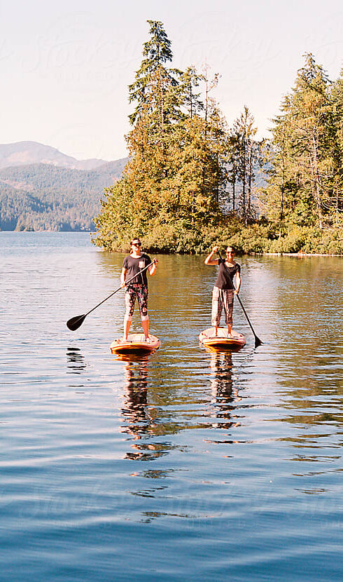 Two people on paddle boards
